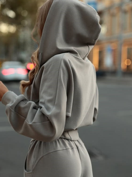 Noir Riviera cinched waist zip hoodie sweatsuit set, waist-cinching detail