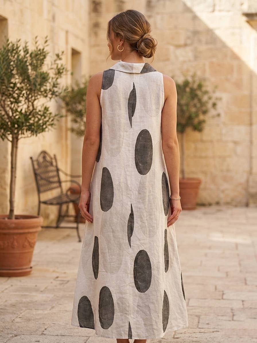 A Long Linen Dress with Oval Motifs and Draped Neckline