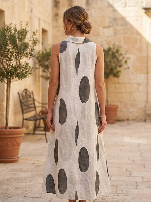 A Long Linen Dress with Oval Motifs and Draped Neckline