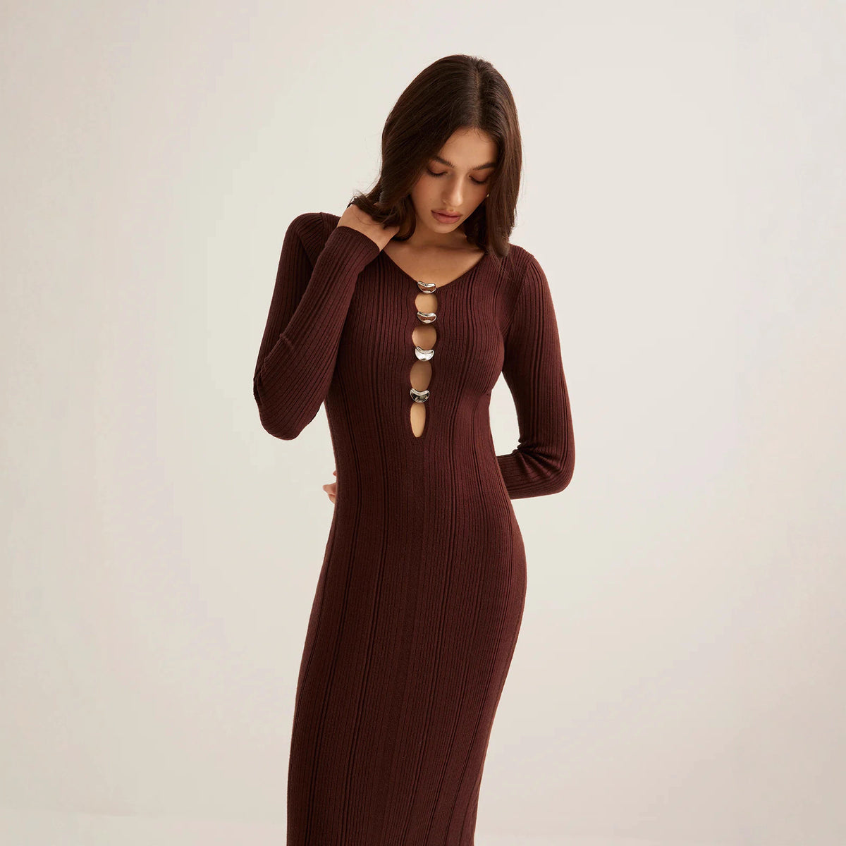 Front view of V-neck knit midi dress with long sleeves, brown knit dress, Noir Riviera