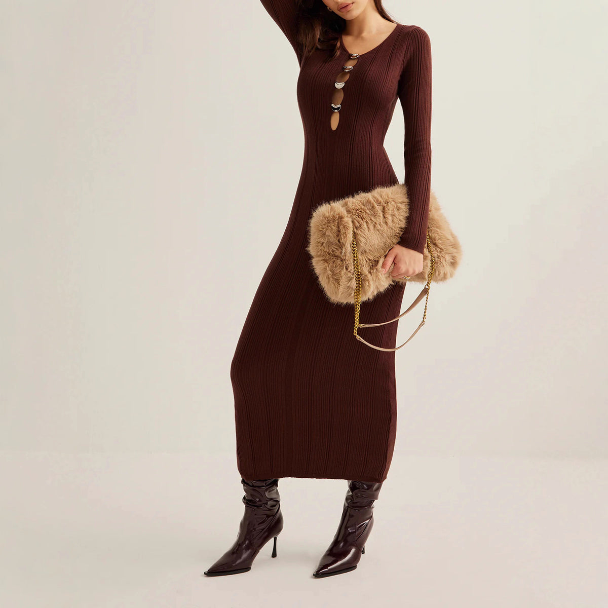 Side profile of slim-fit knit midi dress showing hip-skimming silhouette, Noir Riviera